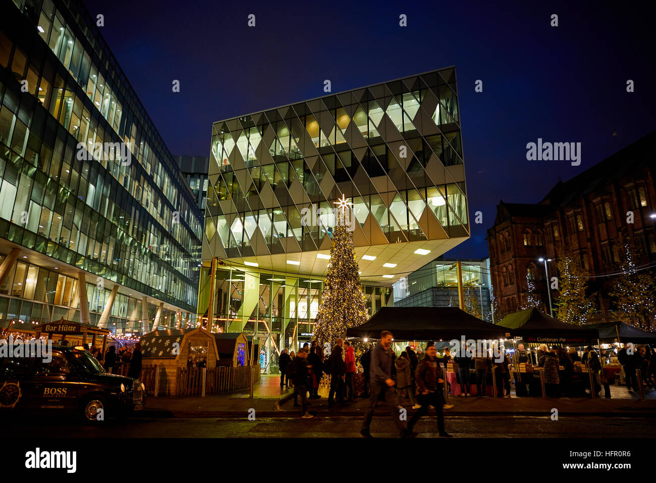 The Avenue Spinningfields Christmas   Manchester city centre Night evening dusk busy markets infant oder office developments Architect  property prope Stock Photo