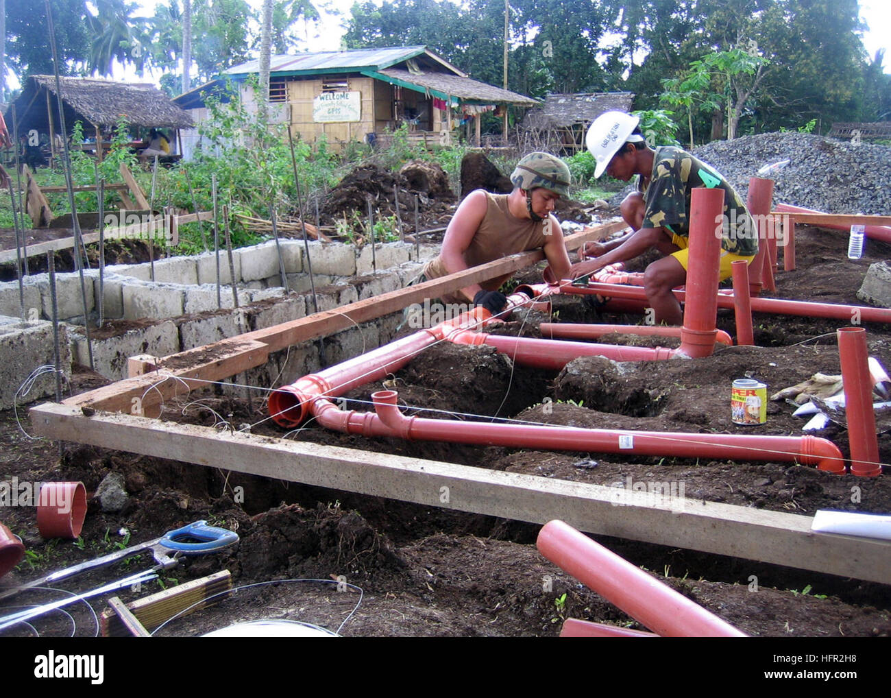 Utilitiesman 3rd Class from NMCB-4 and Philippine Army engineers ...