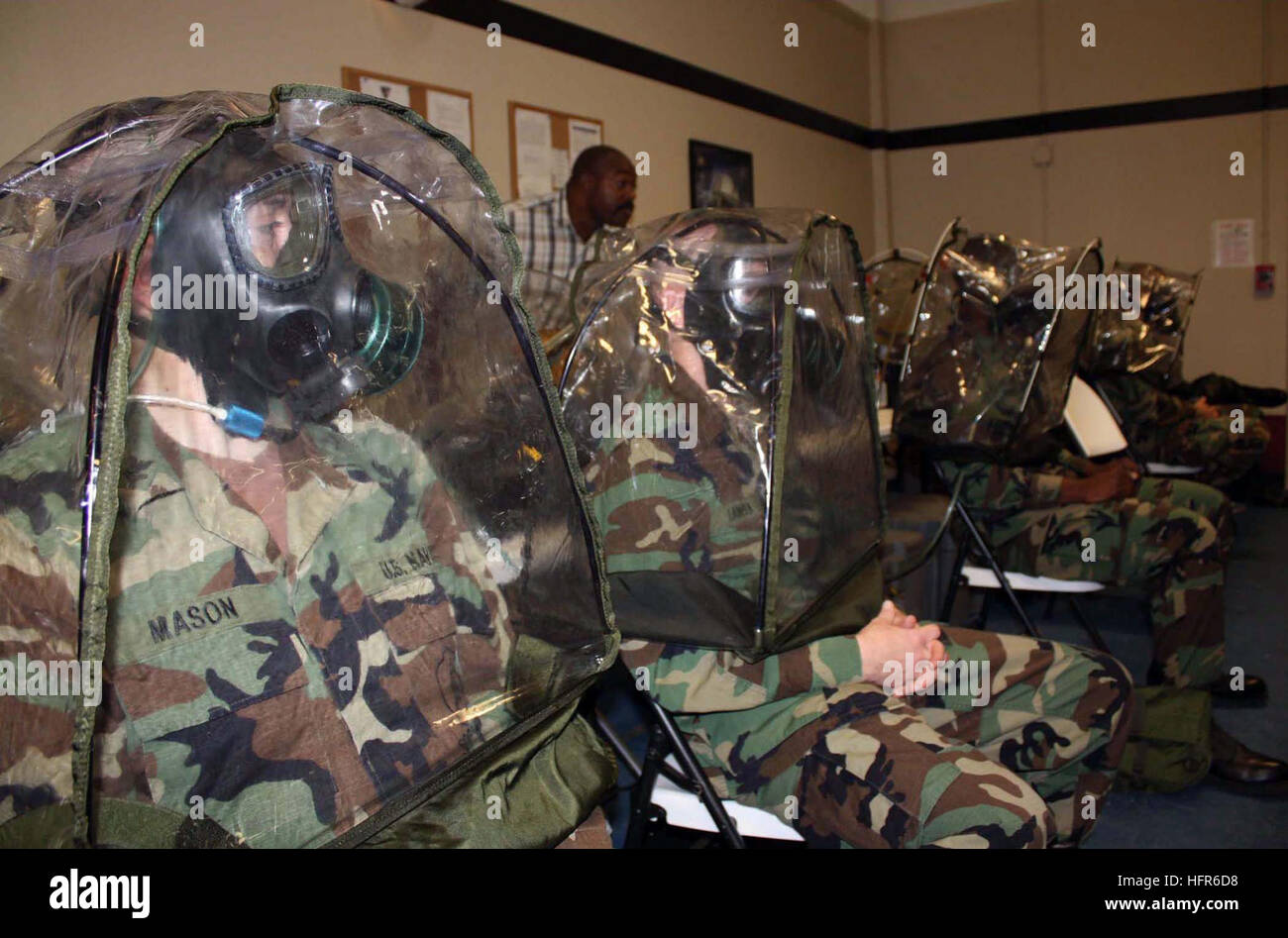 Mobilisation Mask Members of Naval Mobile Construction Battalion 24 are fitted for gas ...