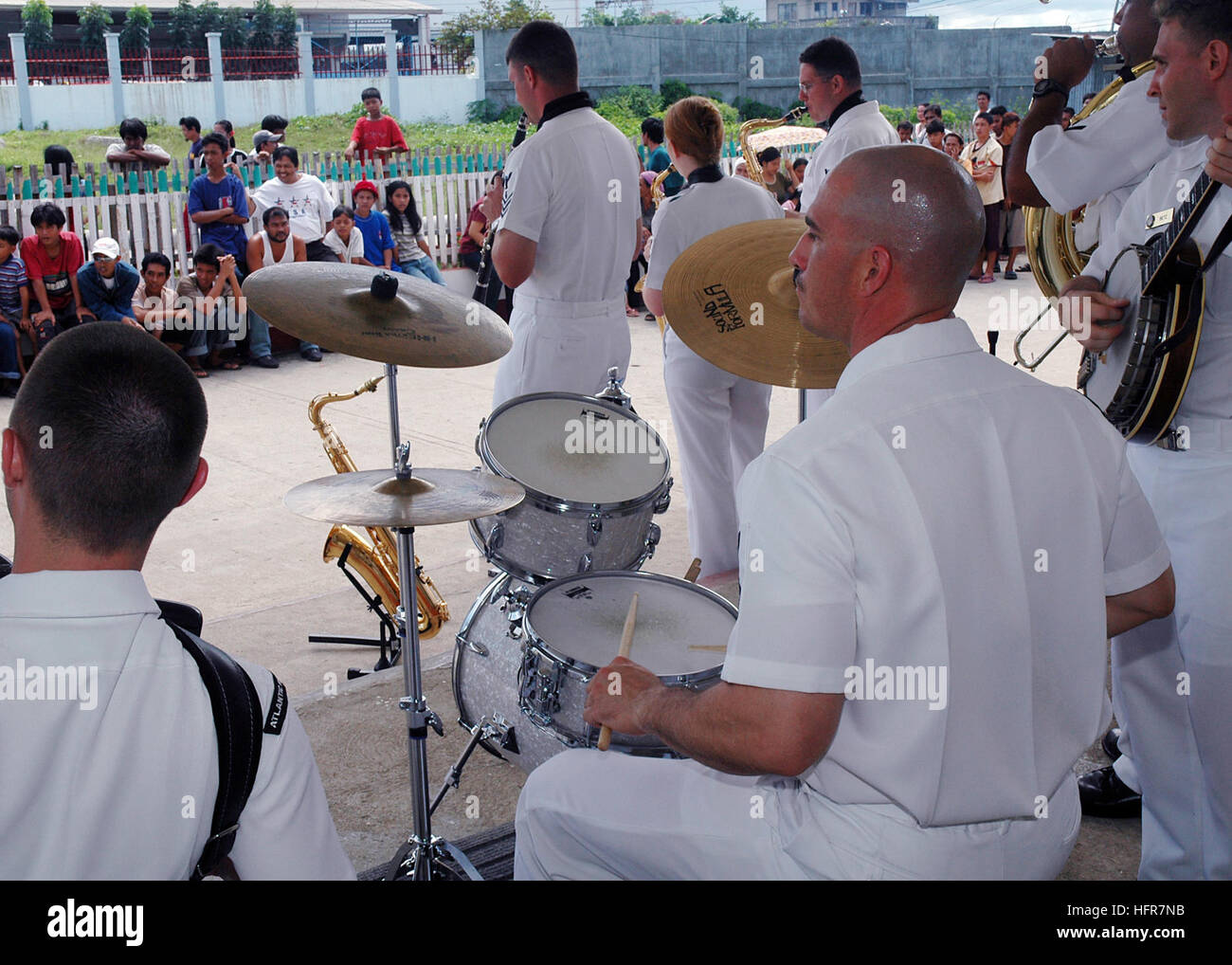 060612-N-3931M-015 Tawi Tawi, Philippines (June 12, 2006) - U.S. Navy Showband Sailors embarked aboard the U.S. Military Sealift Command (MSC) Hospital Ship USNS Mercy (T-AH 19), perform for local residents at the Datu Halun Sakilan Memorial Hospital, while the ship visits the city on a scheduled humanitarian mission. The Mercy has already visited Zamboanga and Jolo, Philippines, where its crew had treated several thousand patients. The ship will bring patients aboard where its doctors will perform major surgeries to remove goiters and cataracts as well as repair cleft lips. Ashore, teams of d Stock Photo