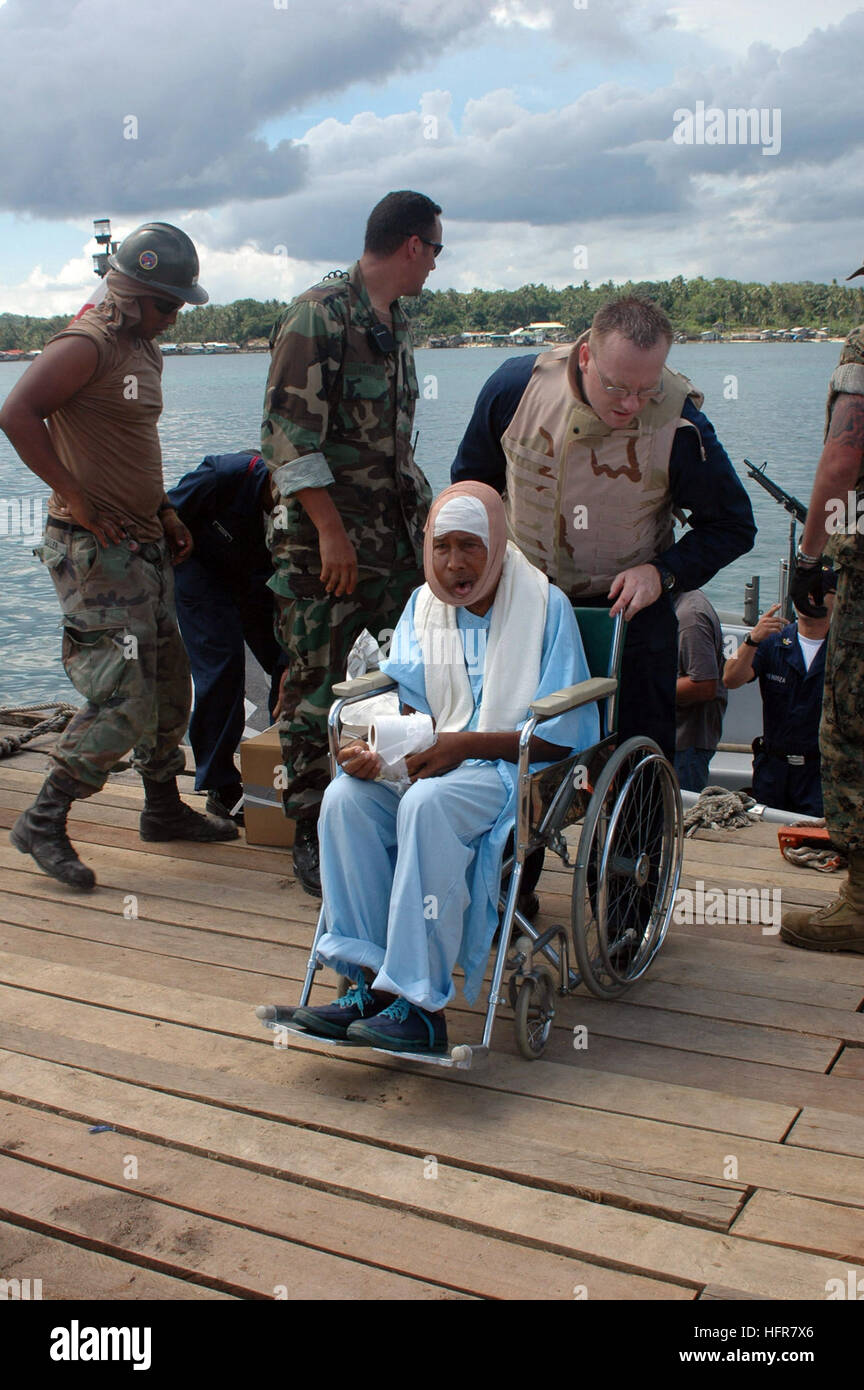 060617-N-9076B-228 Tawi Tawi, Philippines (June 17, 2006) -Patients are discharged from the Medical Treatment Facility aboard the USNS Mercy (T-AH 19), before the ship gets underway.  The ship has just completed three weeks of a scheduled humanitarian mission to the Philippines. Mercy is on a scheduled five-month deployment to host nations in the Pacific Islands, and South and Southeast Asia. Mercy is uniquely capable of supporting medical and humanitarian assistance needs and is configured with special medical equipment and a robust multi-specialized medical team that can provide a range of s Stock Photo