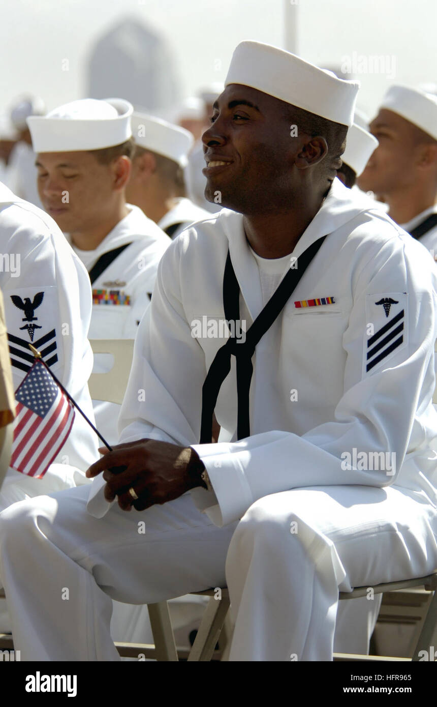 060822-N-0555B-183  Coronado, Calif. (Aug. 22, 2006) - Hospital Corpsman Victor Nwabuzor from Obosi, Nigeria smiles proudly after reciting the Oath of Allegiance during a U.S. Citizenship and Immigration Services (USCIS) swearing-in ceremony on the flight deck aboard USS Ronald Reagan (CVN 76). More than 85 service members from the Army, Navy, Marine Corps and Coast Guard from 29 countries around the world participated in the naturalization ceremony. Ronald Reagan is currently pier-side in its homeport at Naval Air Station North Island. U.S. Navy photo by Mass Communication Specialist 3rd Clas Stock Photo