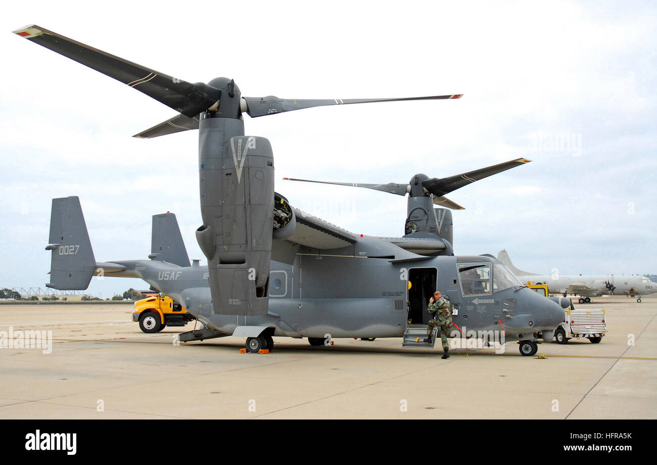 Airmen prepare a CV-22 Osprey Sept. 22 for an exhibition and training exercise with Navy Seals at Naval Air Base North Island, San Diego, Calif. (U.S. Navy photo/Mass Communication Specialist Seaman Daniel A. Barker) V-22 Osprey sideview Stock Photo