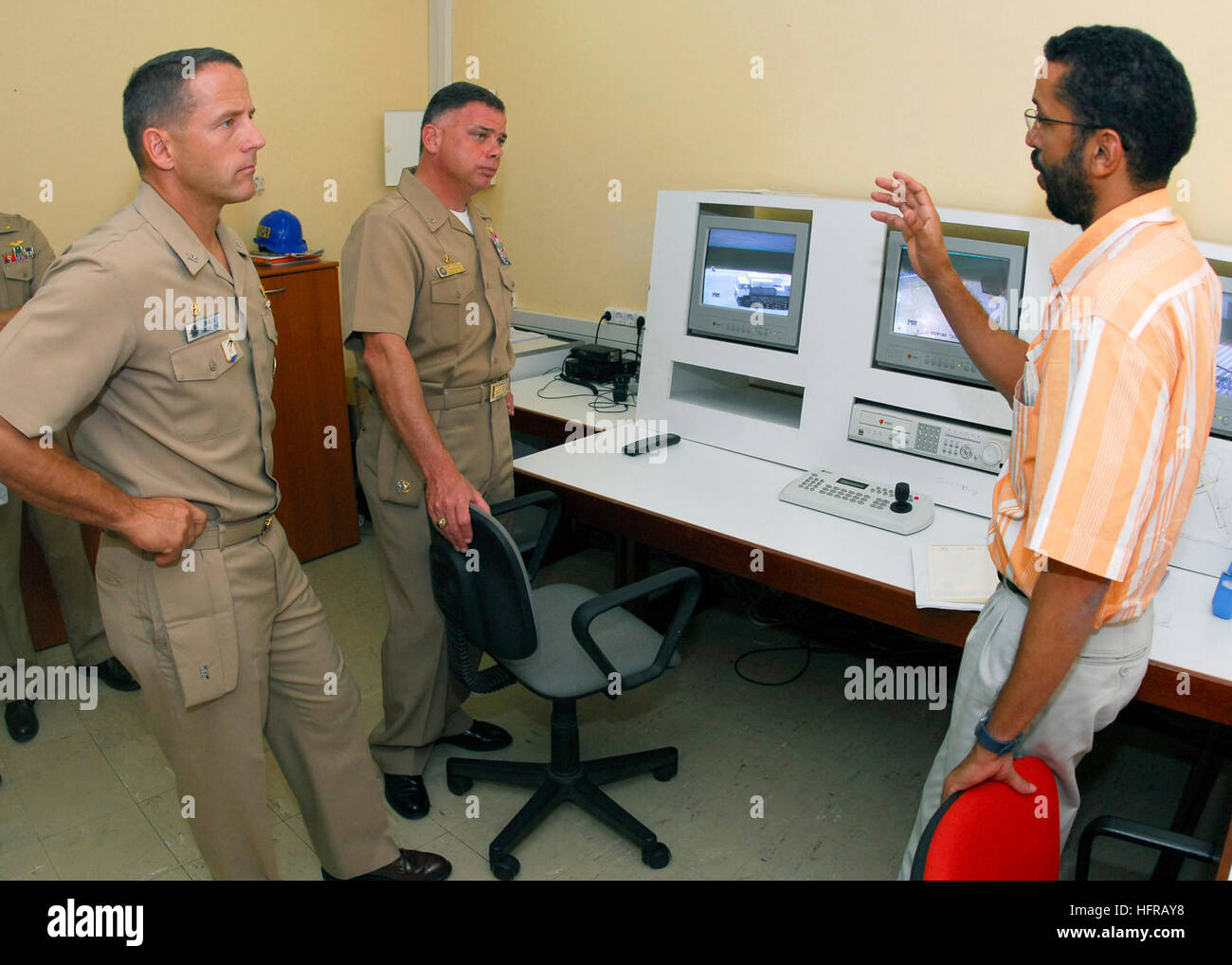 Task Force 67 Commanders from Task Force 65 and Task Force 67 review port security ...