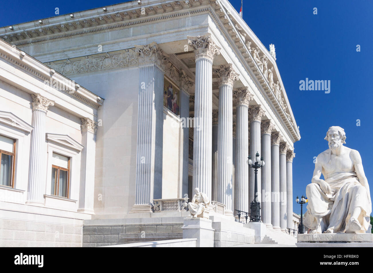 Wien, Vienna: Parliament buildings with statues of Roman historians, Wien, Austria Stock Photo