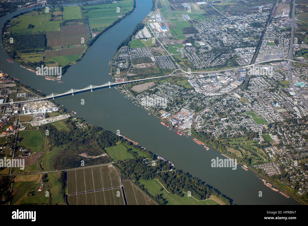 Aerial view of the Golden Ears Bridge crossing the Fraser River in Vancouver BC Canada. Stock Photo