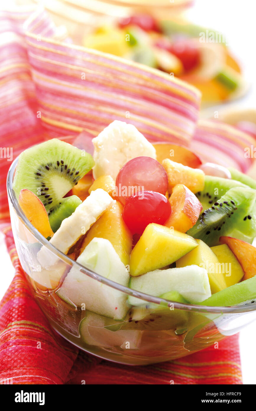 Fruit salad kiwis, bananas, apples, peaches, mangoes, grapes and