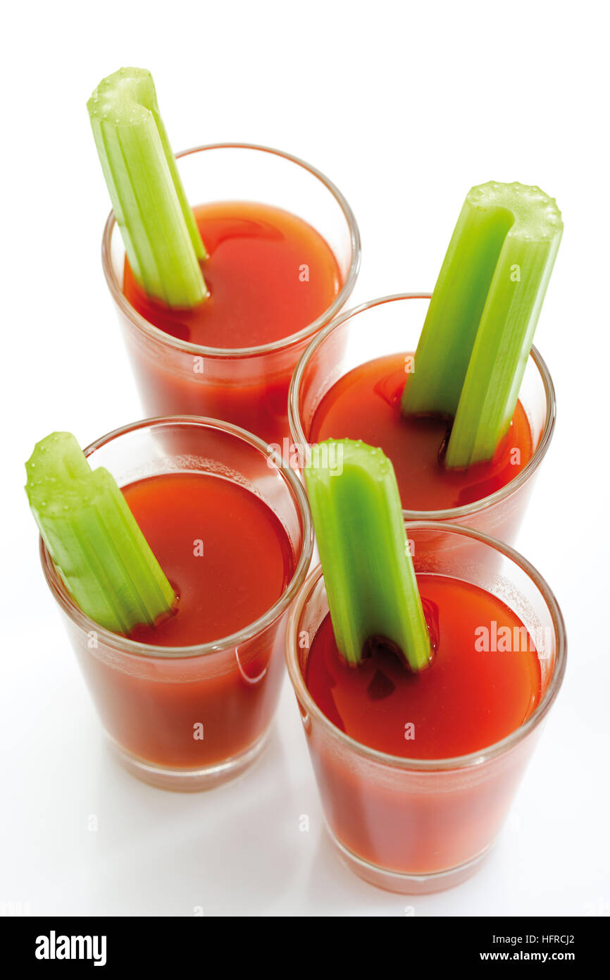 Several Bloody Marys with celery sticks Stock Photo Alamy