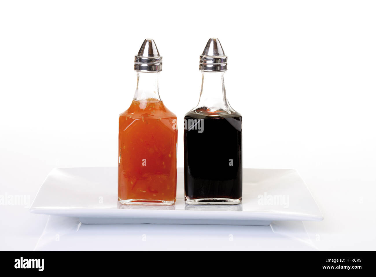 Chili sauce and soy sauce cruet Stock Photo Alamy