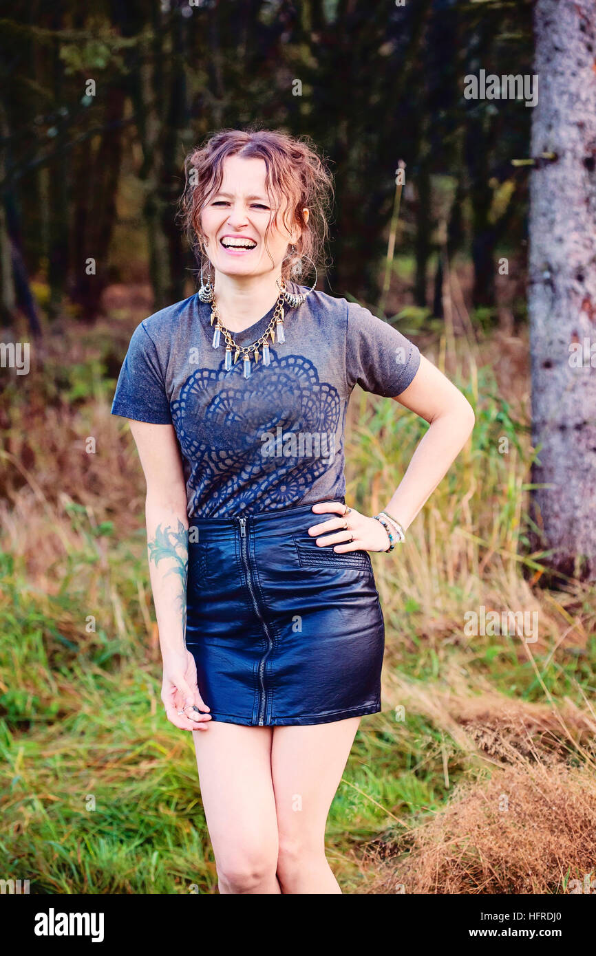 Beautiful woman posing mini hi-res stock photography and images - Alamy