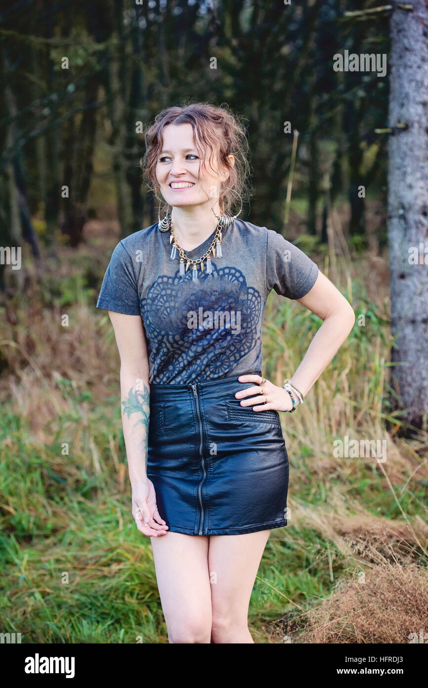 Beautiful woman posing mini hi-res stock photography and images - Alamy