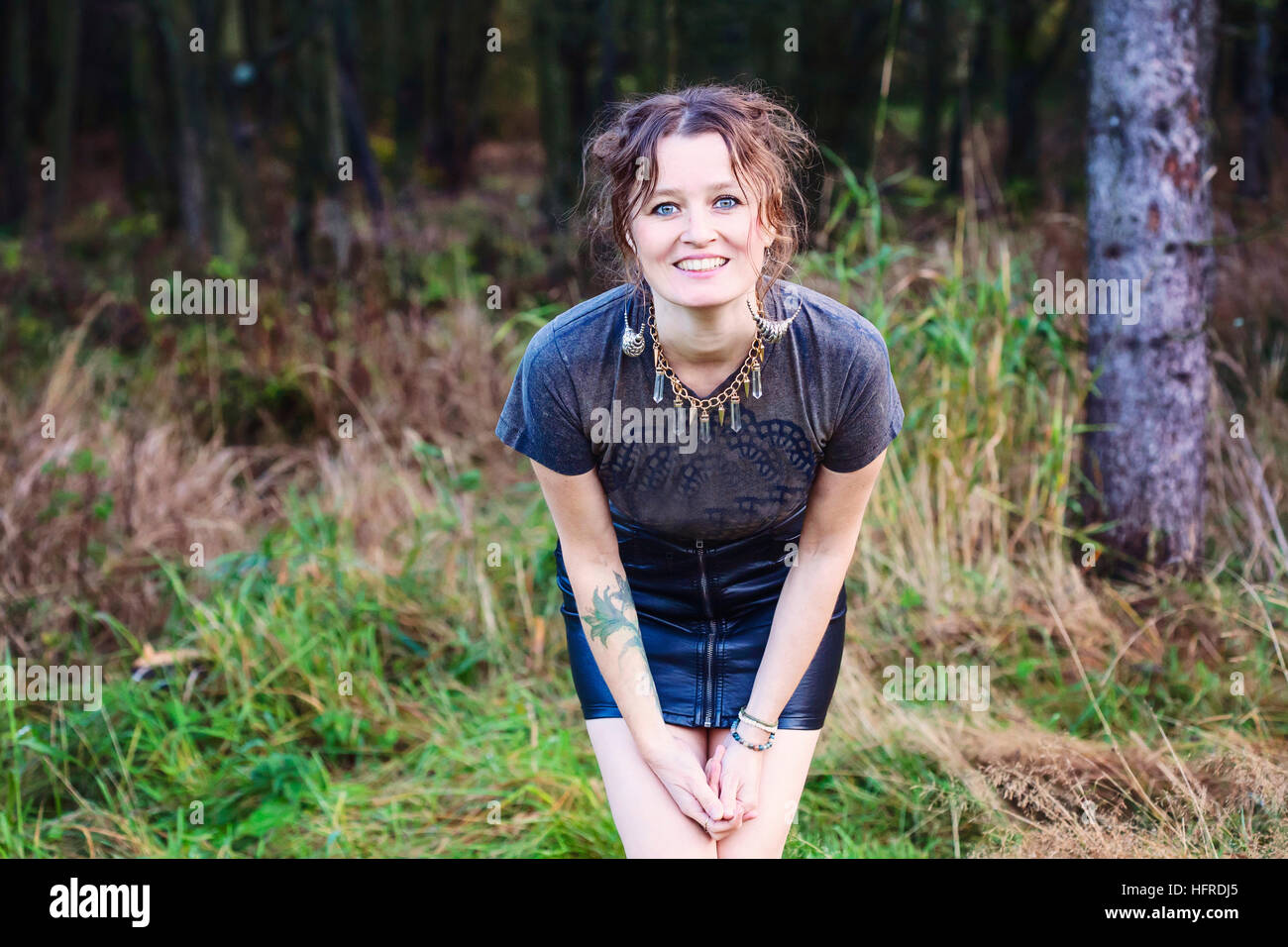Beautiful woman posing mini hi-res stock photography and images - Alamy