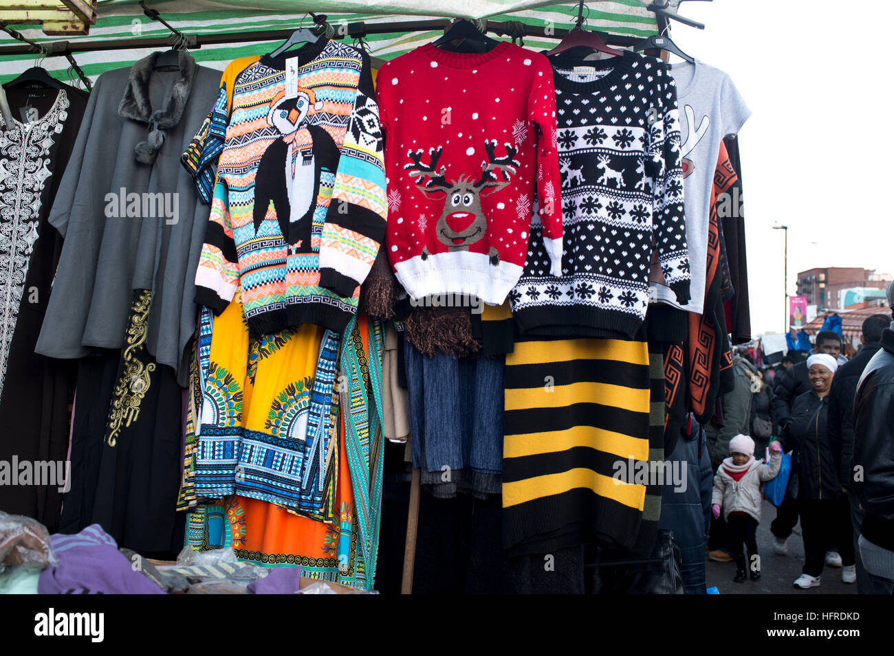 Hackney. Ridley Road market. Christmas jumpers on sale. Stock Photo