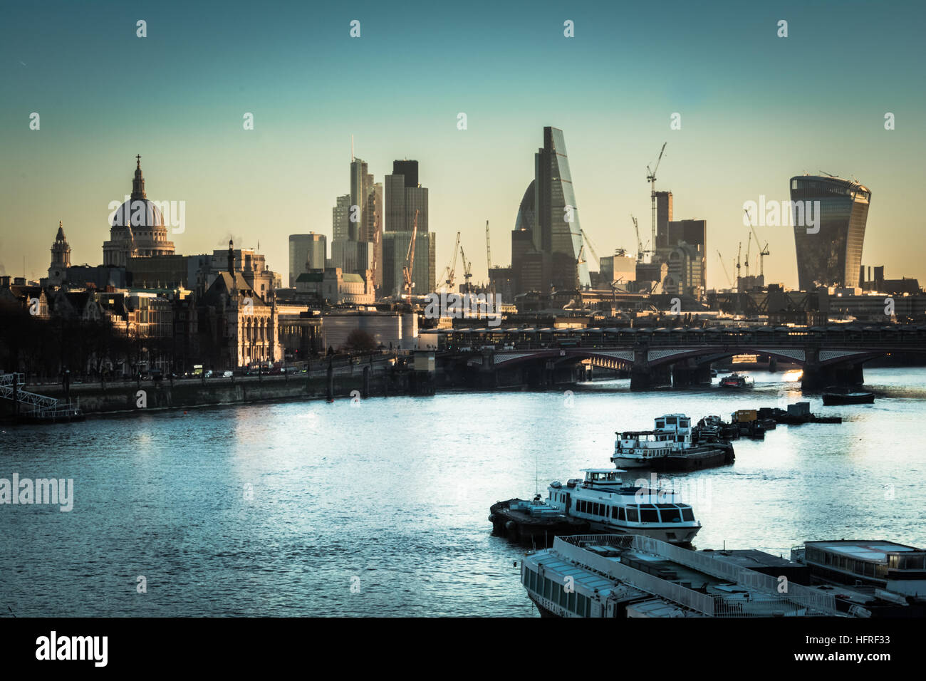 An early morning view of the London Skyline from Waterloo Bridge and the fprmerly proposed site of the Garden Bridge Stock Photo