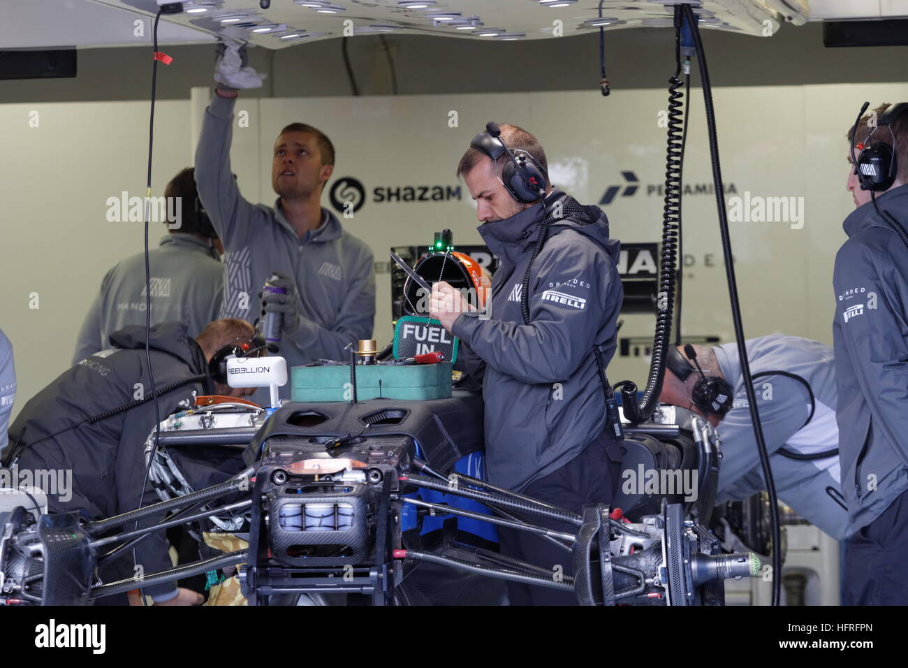 Manor Racing MRT mechanics fine tuning Pascal Wehrlenin car for the Canadian Grand Prix held in