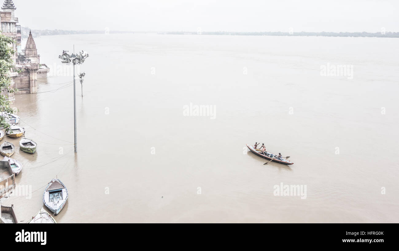 Fishermen on the Ganges river during a period of high water. Varanasi, Uttar Pradesh, India. Stock Photo