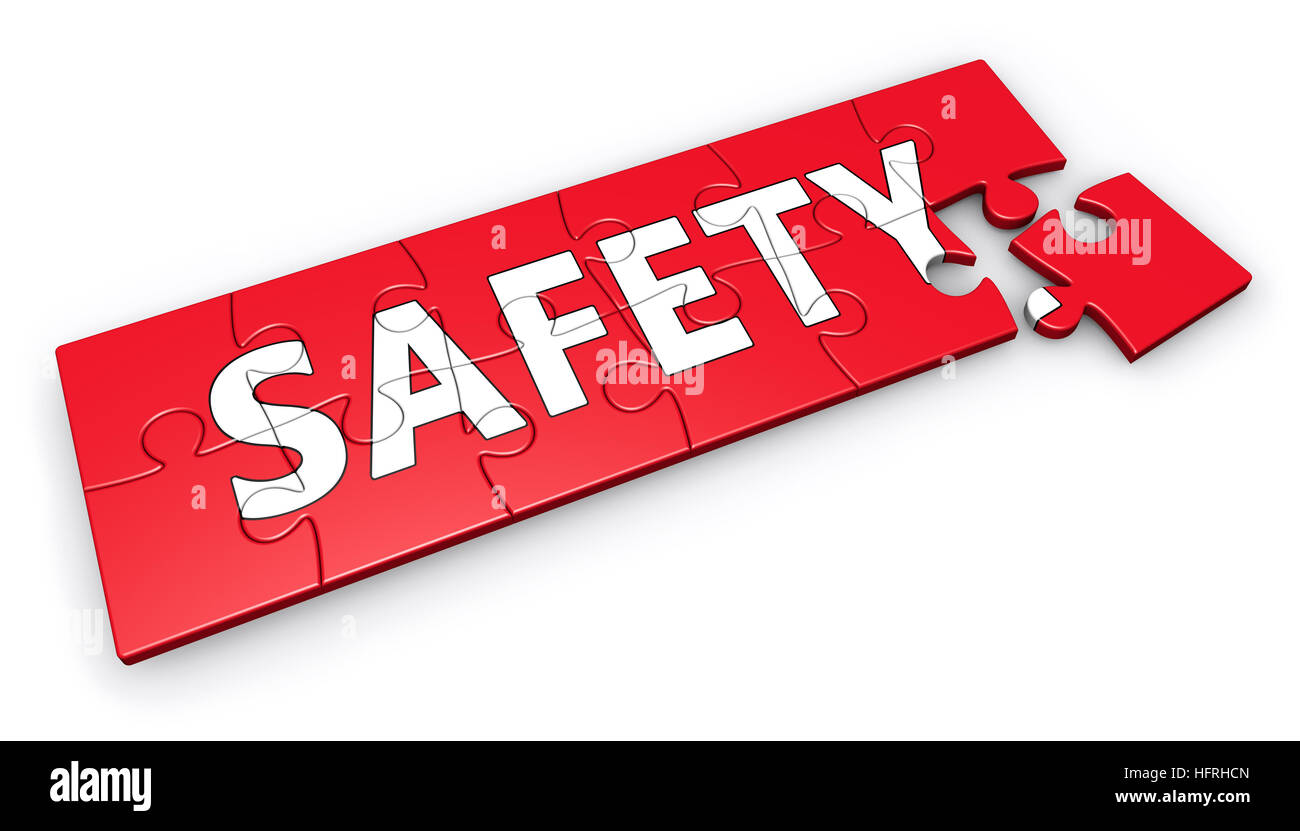 Safety concept with word and sign on a puzzle. Stock Photo