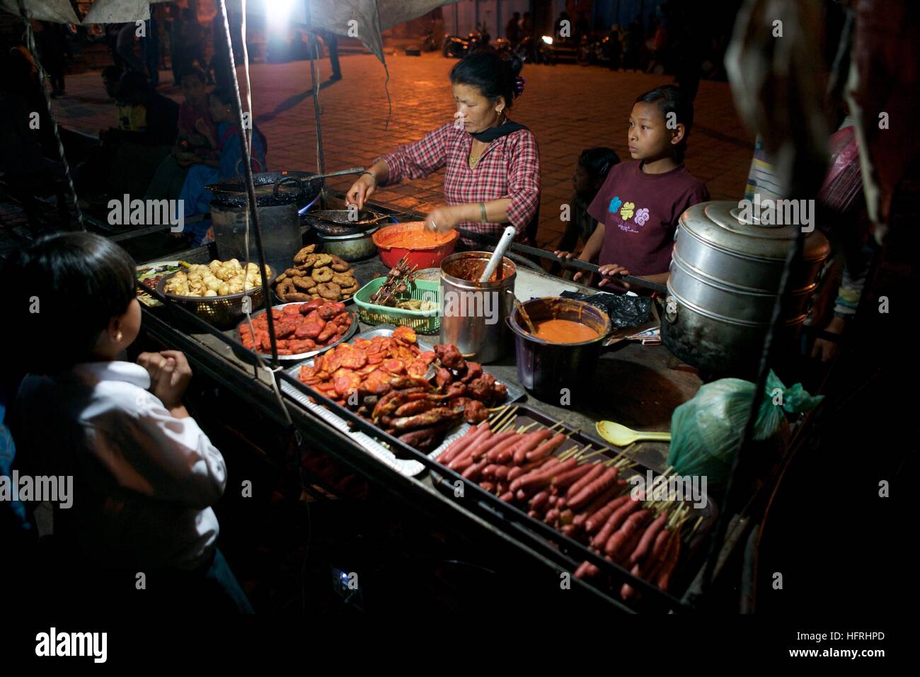 Nepal Kathmandu Asia night street local vendor food sale market Stock Photo