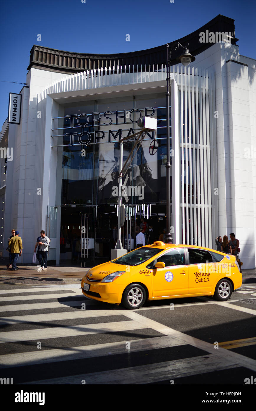 Yellow cab and Topshop store at The Grove, Los Angeles Stock Photo - Alamy