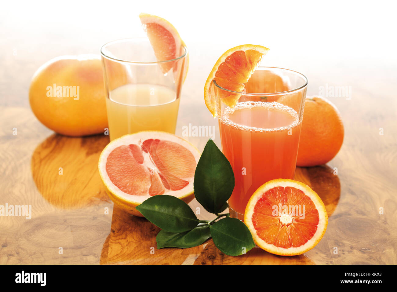 Glasses of fresh orange and grapefruit juice Stock Photo