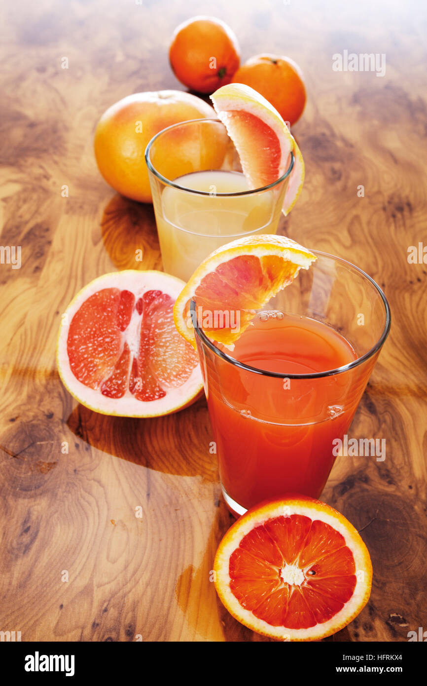 Glasses of fresh orange and grapefruit juice Stock Photo