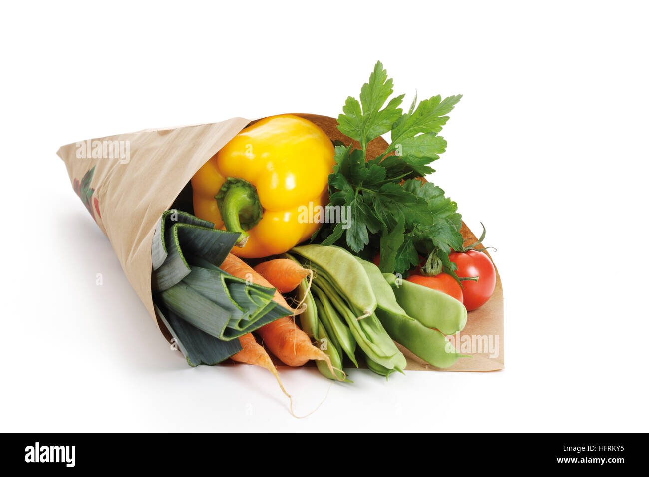 Paper bag filled with vegetables Stock Photo