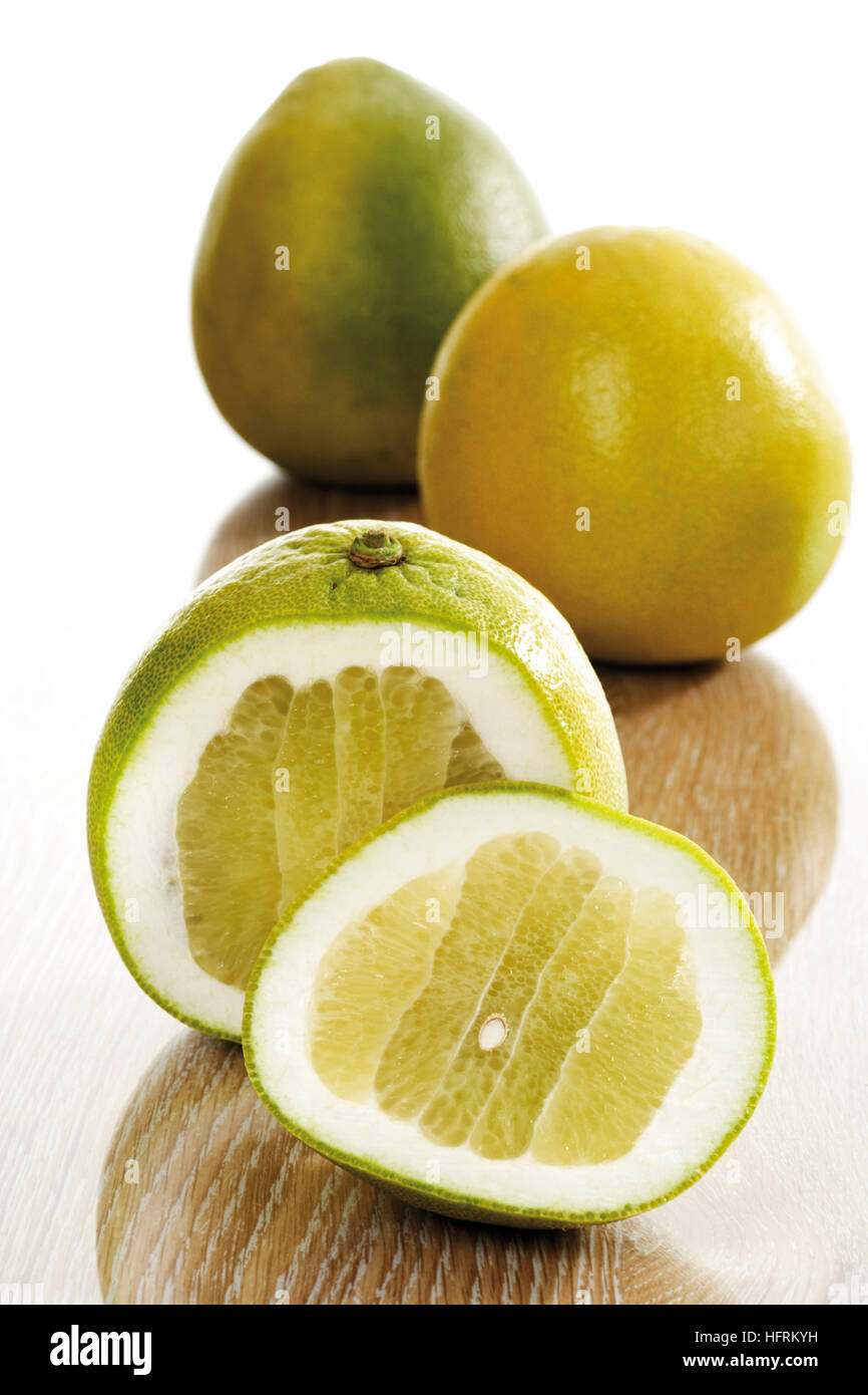 Sliced and whole pomelos (Citrus maxima) Stock Photo