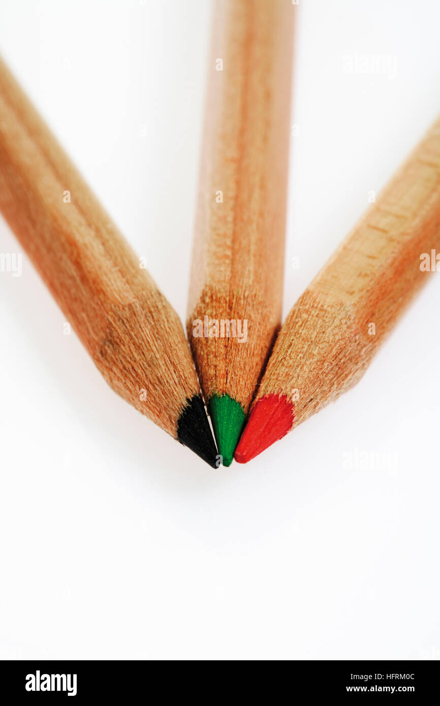 Three pencil crayons (colouring pencils Stock Photo Alamy