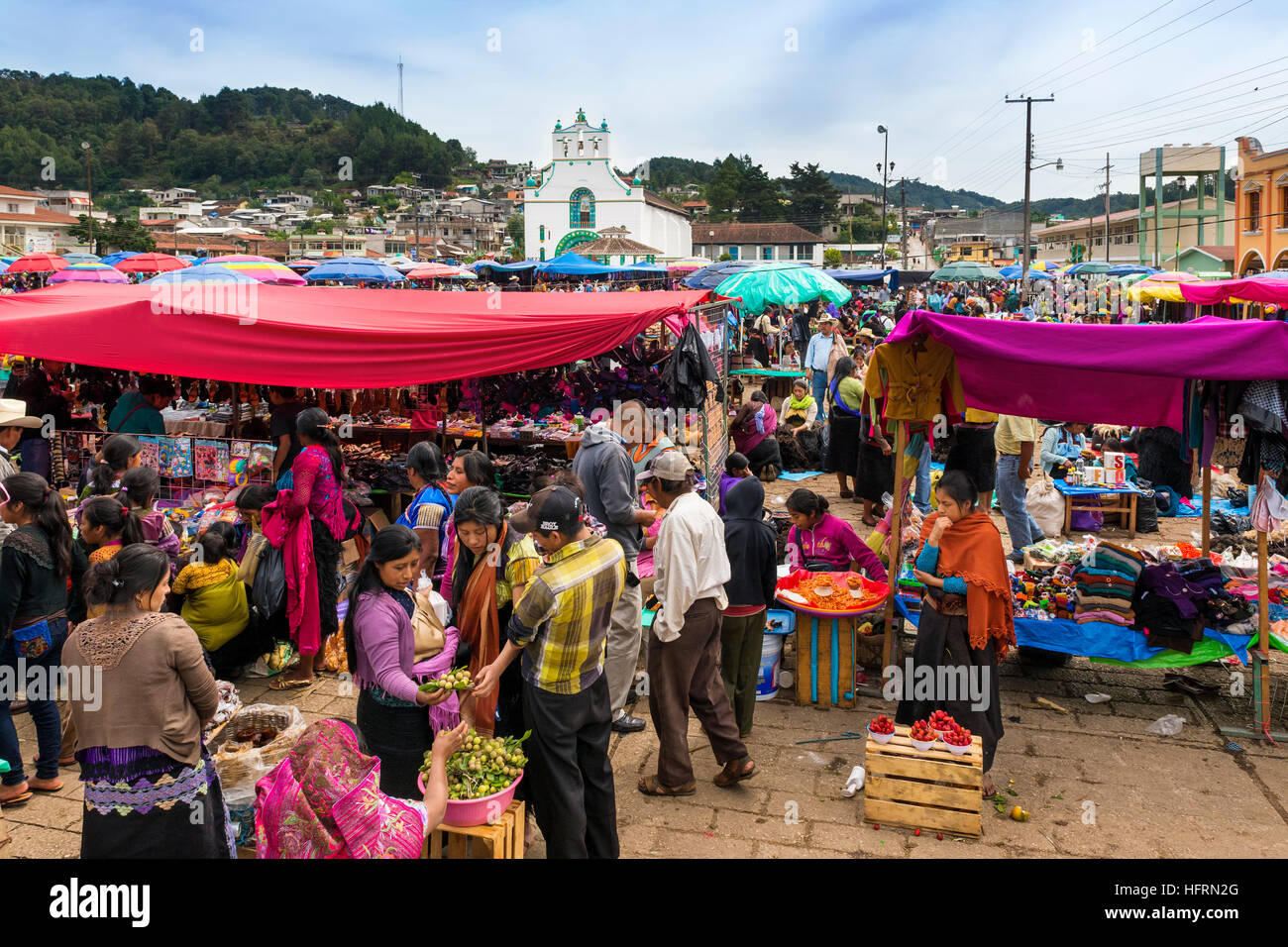 San Juan Chamula - May 11, 2014: Local people in a street market in the town of San Juan Chamula, Chiapas, Mexico Stock Photo