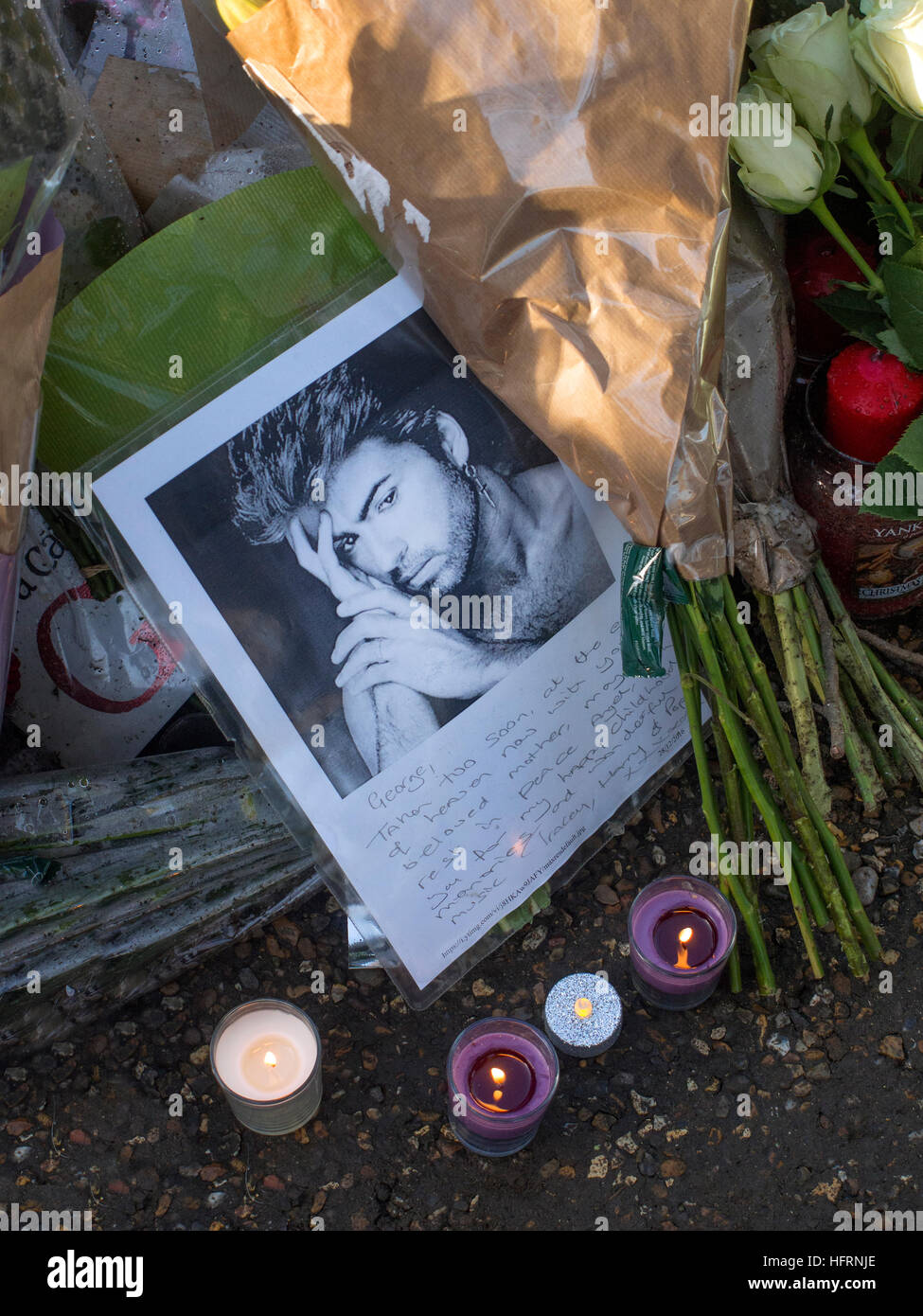Tributes to George Michael outside his home in Highgate North London UK Stock Photo