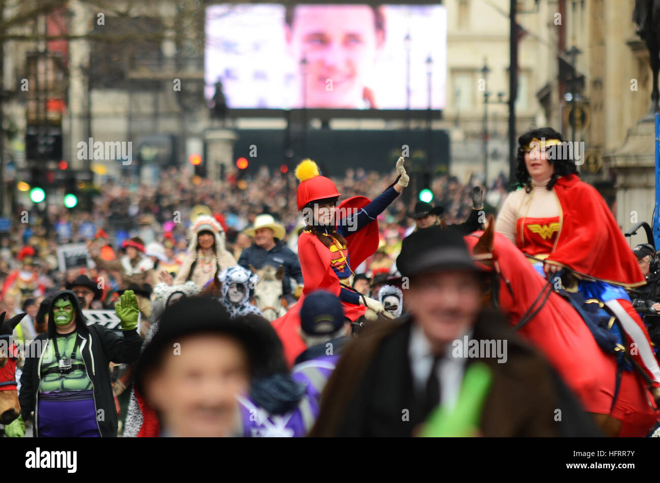 Focusing on a young girl dressed in a 'Super' costume amongst a group of film characters in London's New Year's Day Parade 2017 Stock Photo