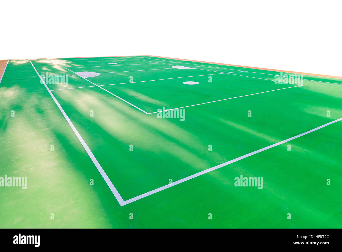 Empty rattan ball court with sunlight in summer. green court floor with white line. Stock Photo