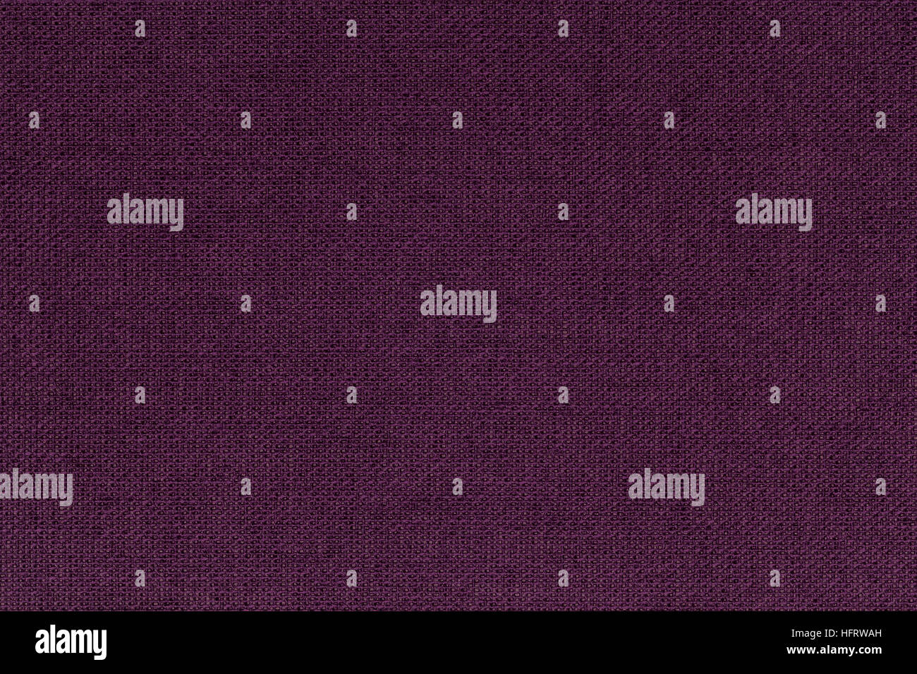 Dark burgundy, purple background from a textile material. Fabric with
