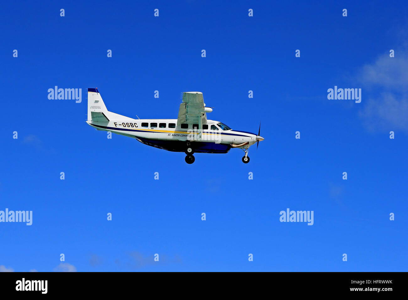 Cessna Grand Caravan 208B aeroplane operated by St Barth Commuter landing at Philipsburg Airport, St Maarten Stock Photo