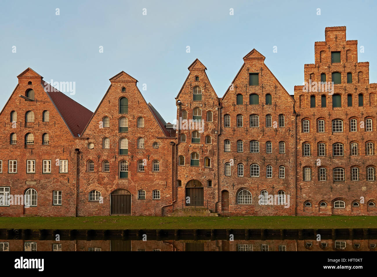 The Salzspeicher of Lübeck, Germany in the warm light of sunrise Stock Photo