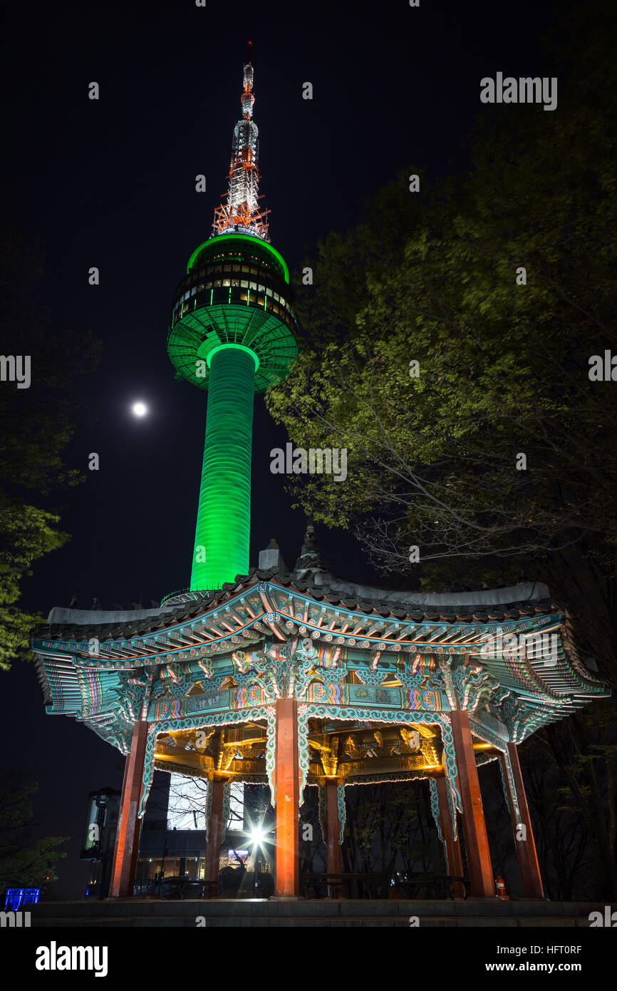 Lit, old & empty pavilion and N Seoul Tower at Namsan Hill (or Namsan Park or Namsan Mountain) in Seoul, South Korea, at night. Stock Photo