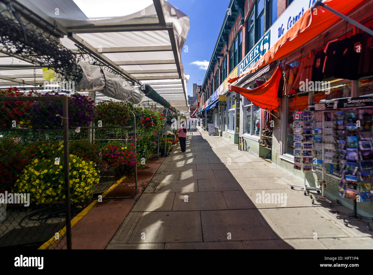 The Byward Market in Ottawa Ontario, Canada features booths set up by florist, dress makers and