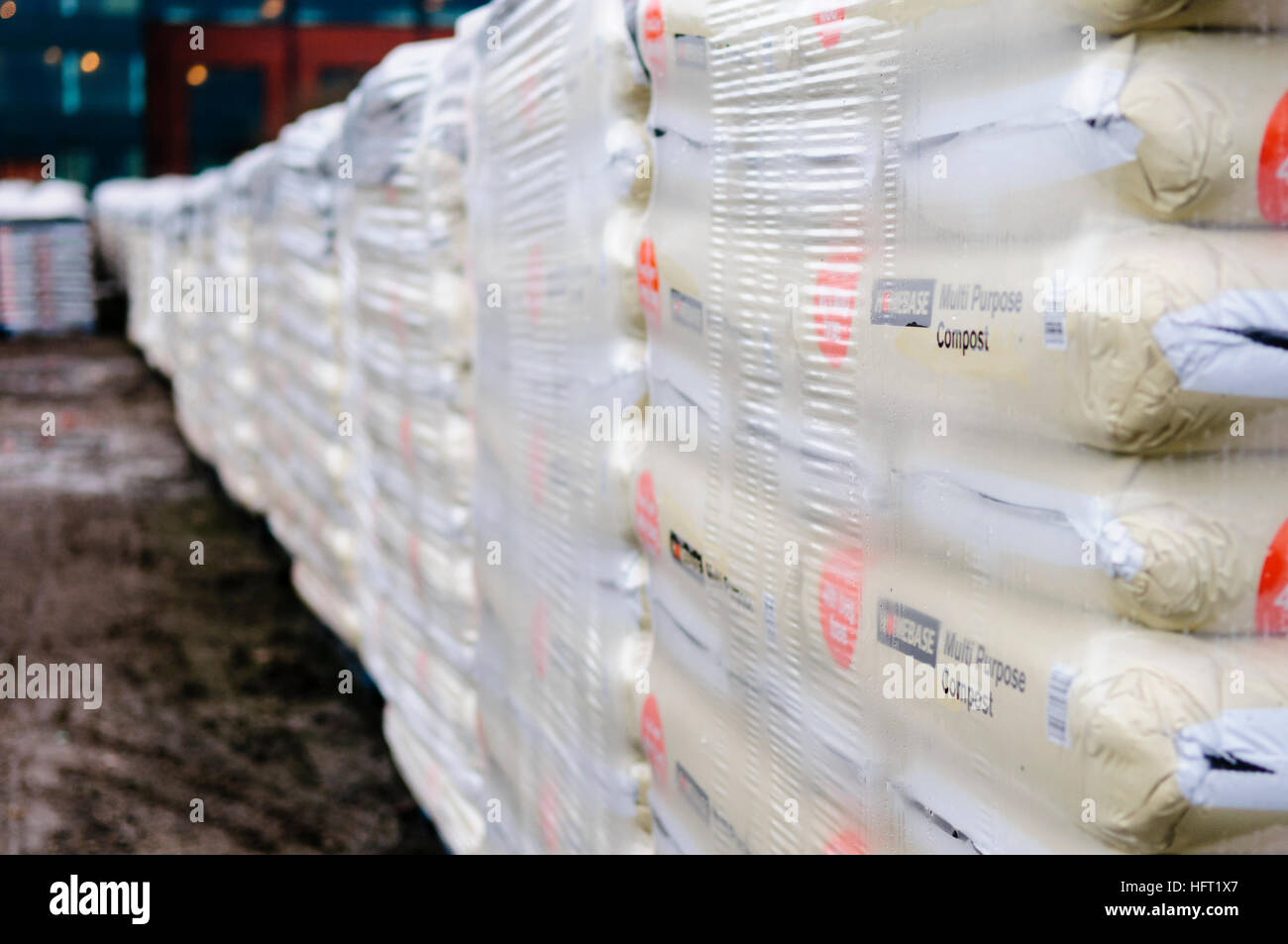 Wrapped pallets of multipurpose compost at Homebase Stock Photo Alamy