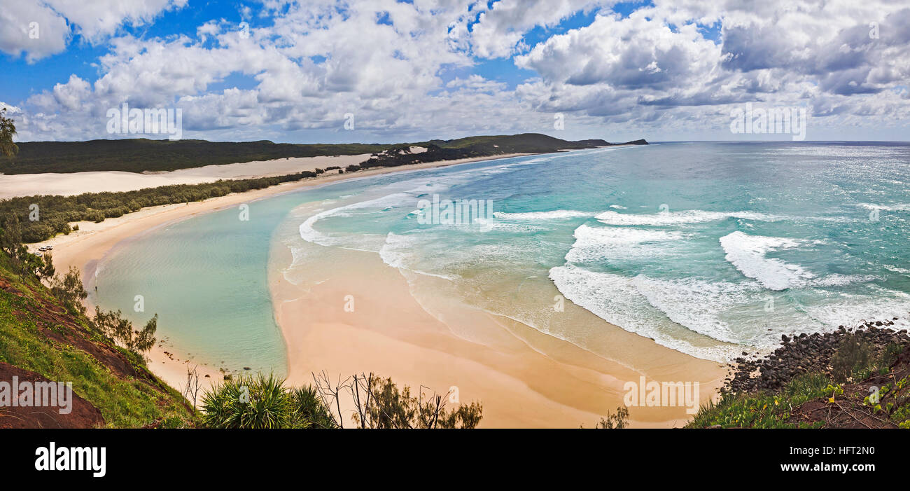 Champagne pool near Indian head landmark on sandy Fraser Island in Queensland. Unique national park is a remote tourist destination on a bright sunny Stock Photo