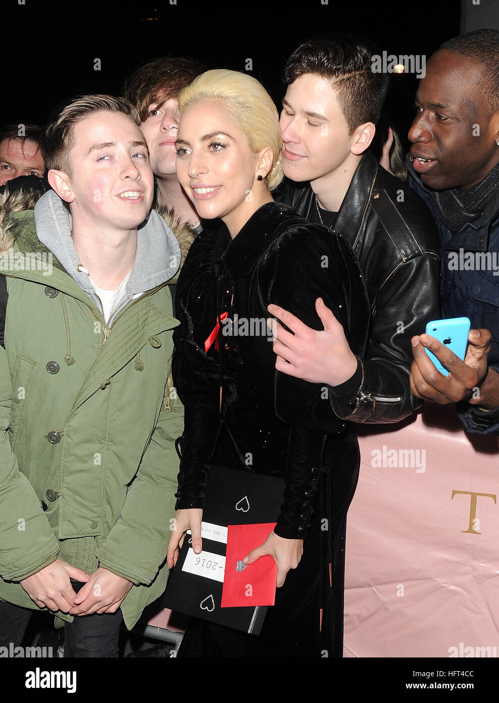 Lady Gaga is greeted by fans as she arrives back at her hotel. One fan