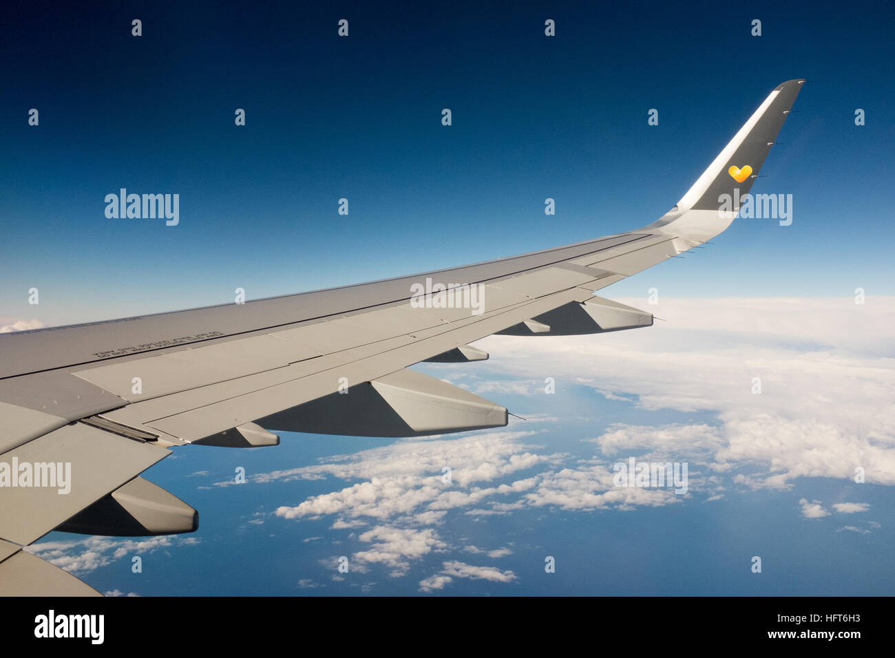 View of aircraft wing during flight Stock Photo - Alamy