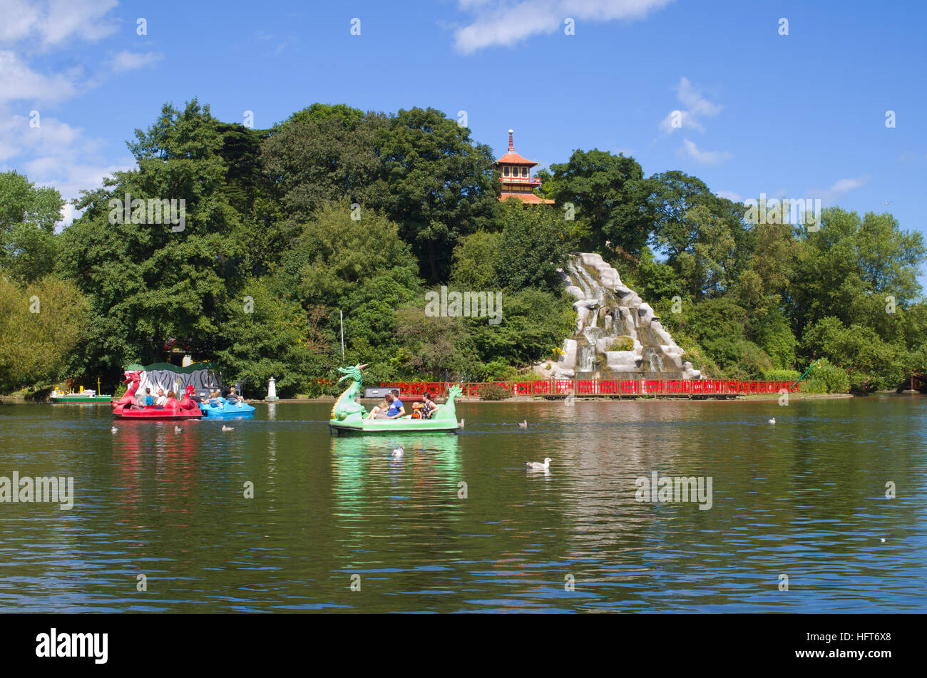 Peasholm Park Scarborough UK North Yorkshire Coast, Tourists on Pleasure boats and paddle boat. Stock Photo