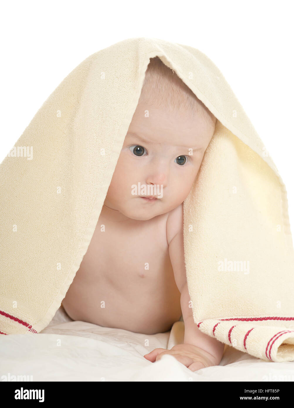 Baby boy lying under blanket Stock Photo Alamy