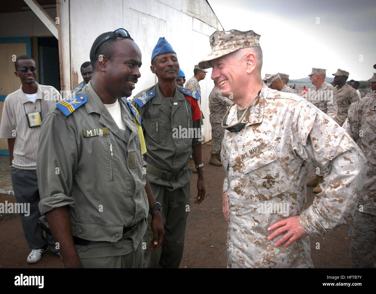 061205-N-1328C-343 - Douda, Djibouti (December 5, 2006) - (Right). U.S. Marine Corps Forces Central Commander, Lt. Gen. James Mattis visits with local officials from Douda, Djibouti, during Djibouti, home of the Combined Joint Task Force - Horn of Africa command. Combined Joint Task Force-Horn of Africa is a unit of United States Central Command. The organization's mission is to prevent conflict, promote regional stability and protect Coalition interests in order to prevail against extremism. More than 1,500 people from each branch of the U.S. military, civilian employees, Coalition forces and Stock Photo