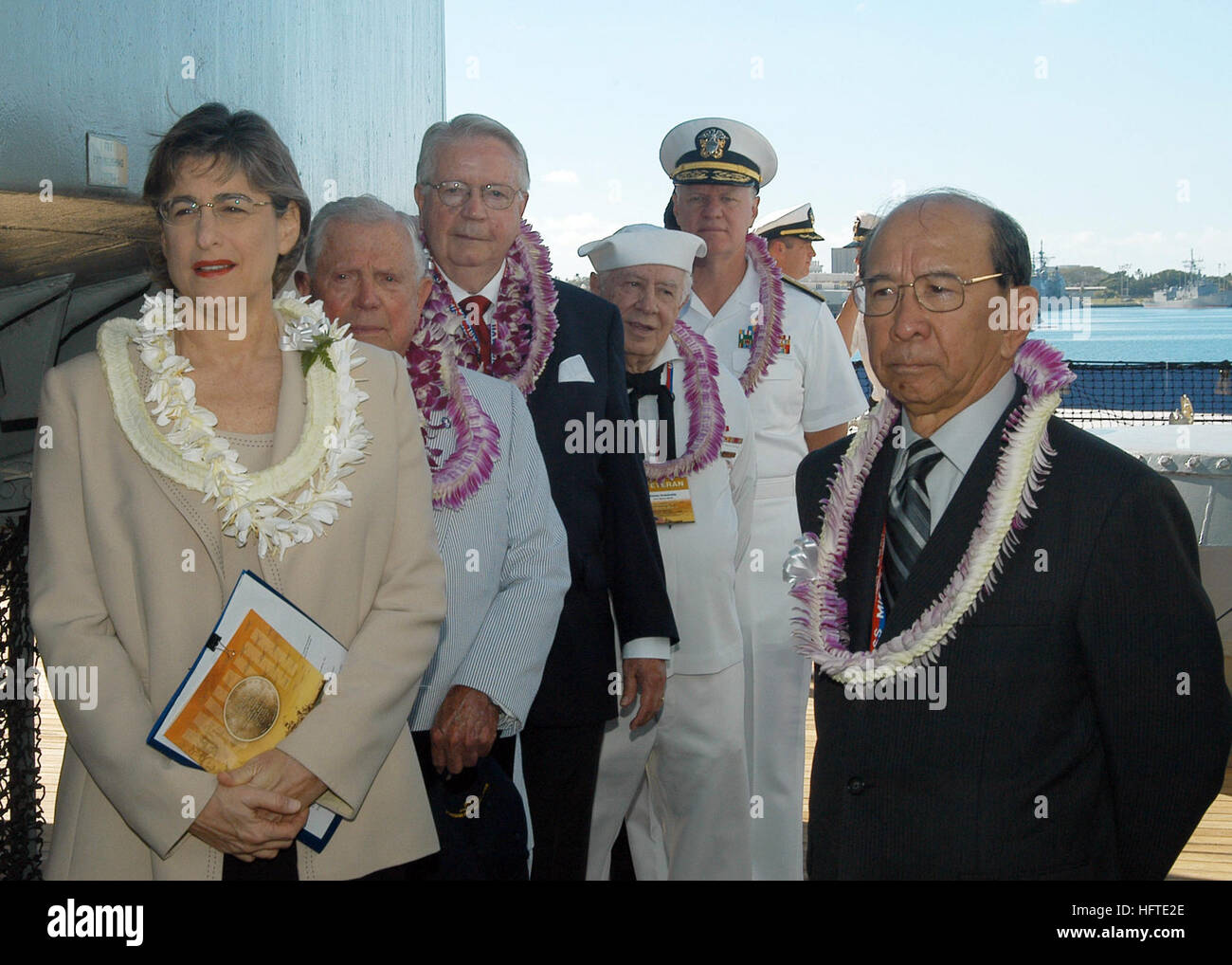 050902-N-6775N-096 Pearl Harbor, Hawaii (Sept. 2, 2005) - Members of the official party, including Hawaii Gov. Linda Lingle, prepare to enter the ceremonial stage prior to the start of the 60th Anniversary of the end of World War II held aboard the USS Missouri Memorial. The event, which included more than 2,500 military personnel, veterans and invited guests, commemorated Japan’s formal surrender and included a missing man fly-over of F-16s by the Hawaii National Guard, a U.S. Marine Corps rifle salute and remarks by U.S. Pacific Fleet Commander, Adm. Gary Roughead. U.S. Navy photo by Photogr Stock Photo