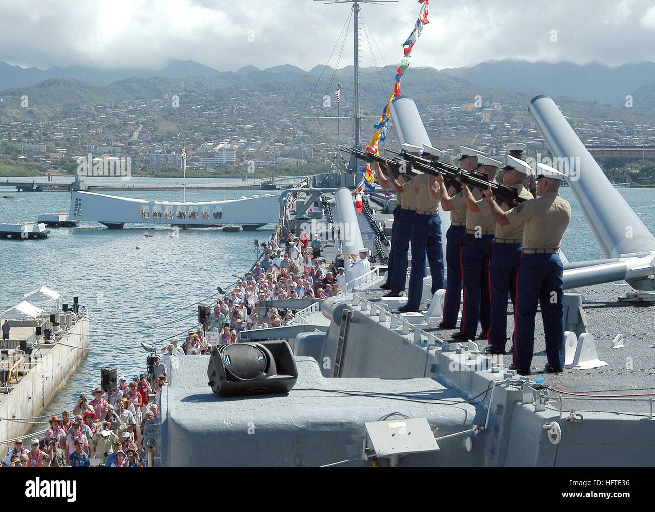 050902-N-6775N-013 Pearl Harbor, Hawaii (September 2, 2005)... Marines from Marine Forces Pacific, Hawaii perform the ceremonial ìRifle Volley Saluteî during the 60th Anniversary of the end of World War II held on board the USS Missouri(BB 63) Memorial in Pearl Harbor, Hawaii.  The event is a commemoration of the formal surrender of Japan marking the end of the war. The surrender took place onboard USS Missouri Sept. 2, 1945, in Tokyo Bay. Official U.S. Navy photo by Photographer's Mate 2nd Class Justin P. Nesbitt (Released) US Navy 050902-N-6775N-013 A formation of Marines assigned to Marine  Stock Photo