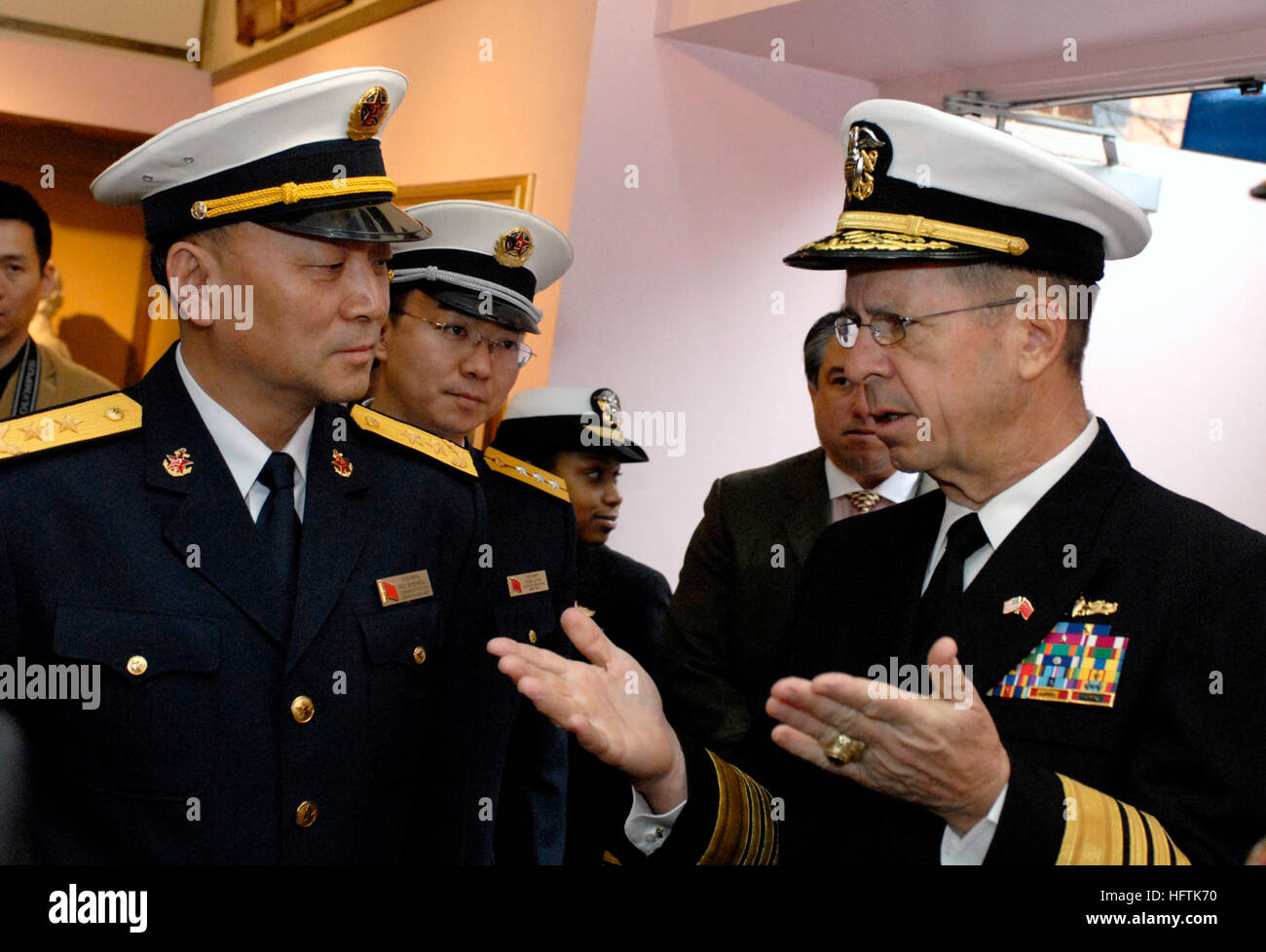 070404-N-0696M-018 WASHINGTON (April 4, 2007) - Chief of Naval Operations (CNO) Adm. Mike Mullen speaks with Chinese People's Liberation Army Navy Commander-in-Chief Adm. Wu Shengli, after a Full Honors Ceremony at the Naval Museum in Washington, D.C. on April 4, 2007. U.S. Navy photo by Mass Communication Specialist 1st Class Chad J. McNeeley (RELEASED) US Navy 070404-N-0696M-018 Chief of Naval Operations (CNO) Adm. Mike Mullen speaks with Chinese People's Liberation Army Navy Commander-in-Chief Adm. Wu Shengli, after a Full Honors Ceremony Stock Photo