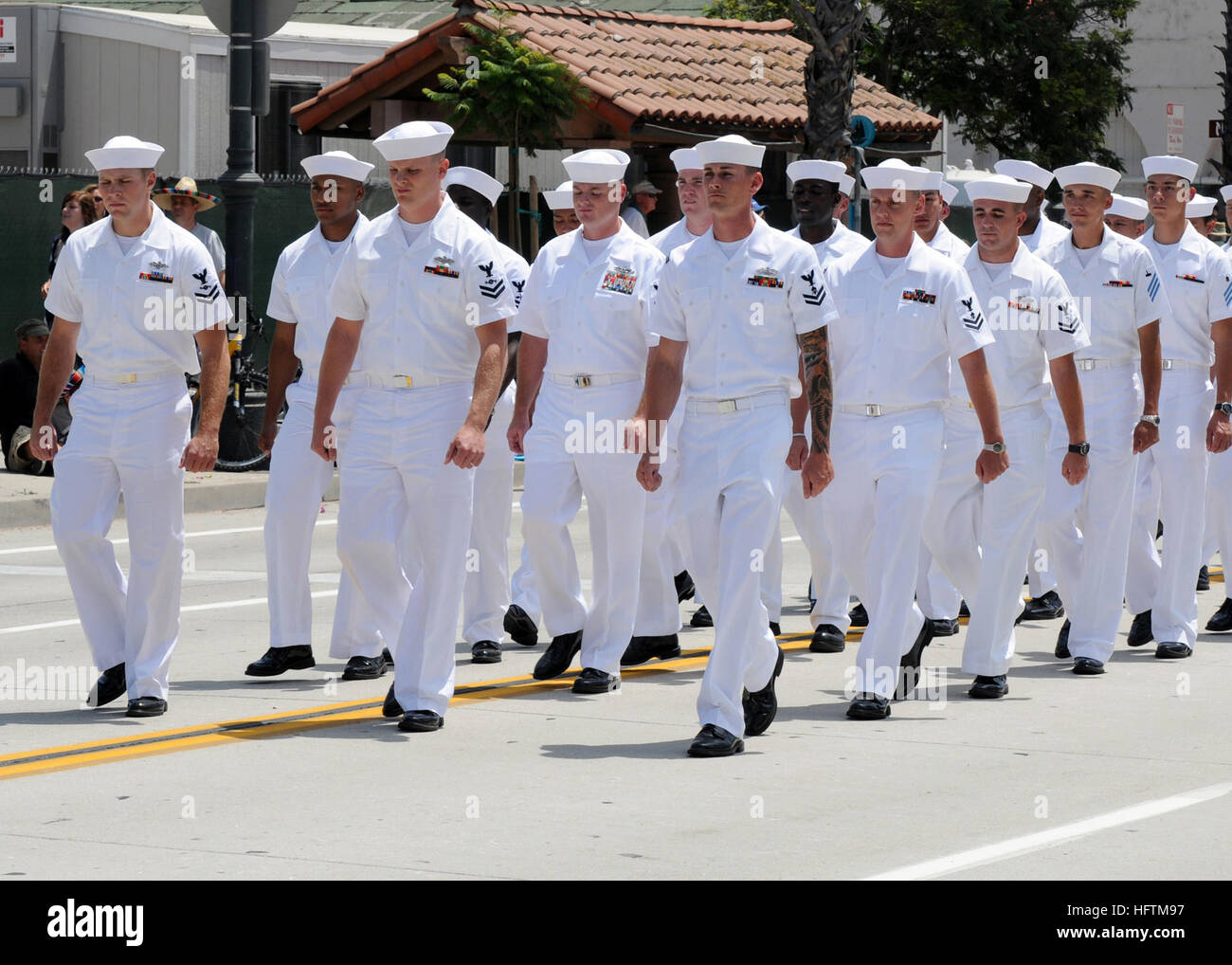 080801-N-8547M-017 SANTA BARBARA, Calif. (Aug. 1, 2008) Seabees from Naval Mobile Construction Battalion (NMCB) 5 march in a fiesta day parade representing the 100th anniversary of the Great White Fleet. NMCB-5 is engaged in an aggressive homeport training cycle in preparation for the upcoming Iraq deployment. (U.S. U.S. Navy photo by Mass Communication Specialist 3rd Class Patrick W. Mullen III/Released) US Navy 080801-N-8547M-017 eabees from Naval Mobile Construction Battalion (NMCB) 5 march in a fiesta day parade representing the 100th anniversary of the Great White Fleet Stock Photo
