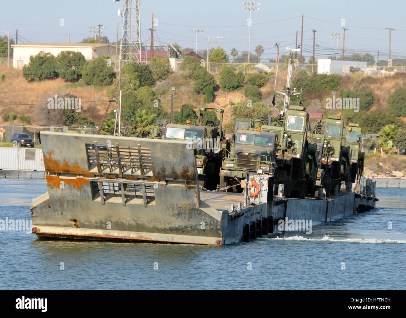 The Improved Navy Lighterage System (INLS) transports Army rolling ...