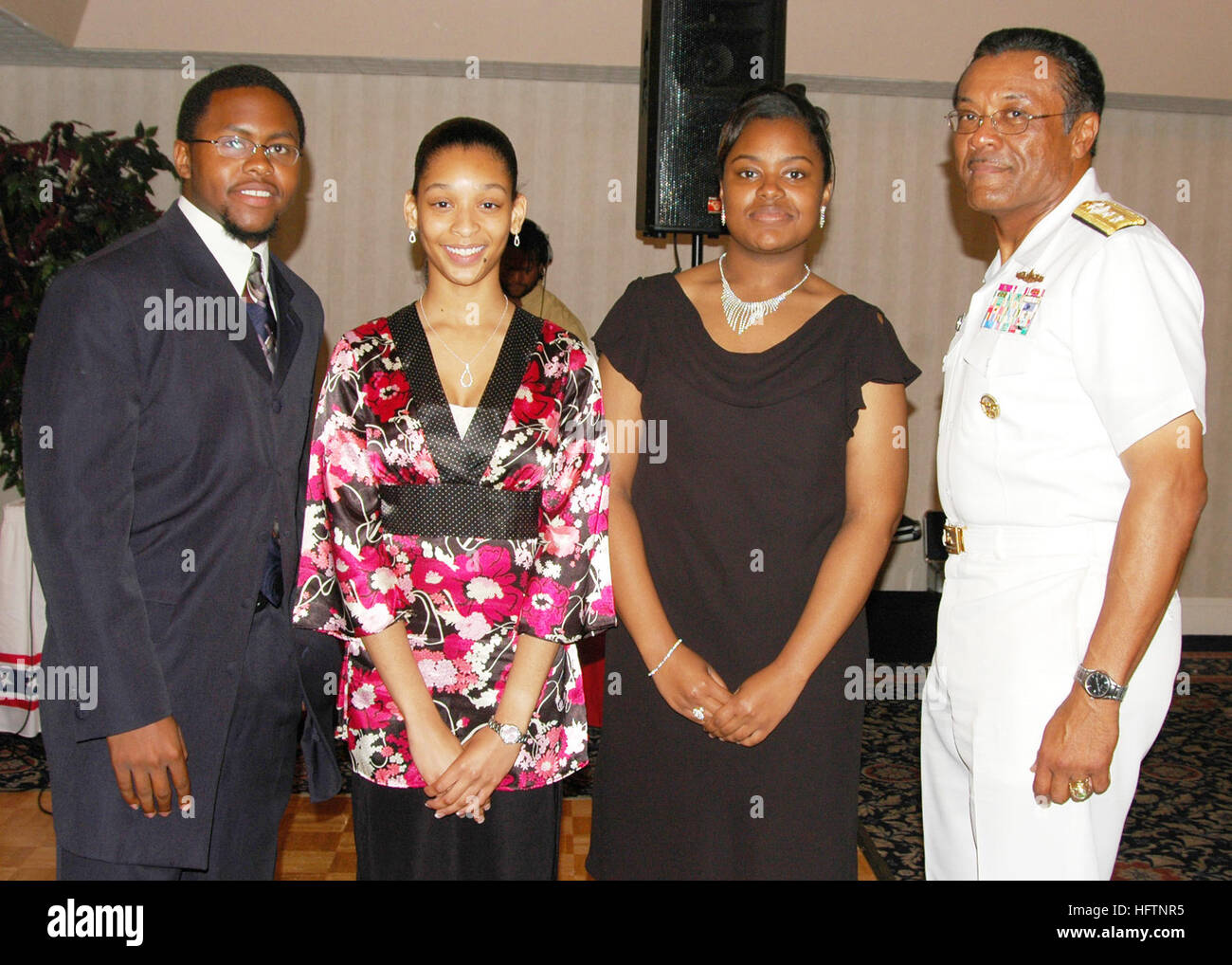 070512-N-2456S-125  NORFOLK, Va (May 12, 2007) - Scholarship recipients (from the left) Gerald M. Fleming II, a Maury High School senior, Sandra Beale and Clarissa Epps, both Lakeland High School seniors, stand with Rear Adm. D.C. Curtis, commander, Naval Surface Force, U.S. Atlantic Fleet, after he presented them with the Vice Admiral Samuel L. Gravely Scholarship. The scholarships were awarded at a banquet hosted by the National Naval Officer's Association (NNOA) Tidewater Chapter at Naval Station Norfolk's Breezy Point Officers Club. U.S. Navy photo by Mass Communication Specialist Seaman J Stock Photo